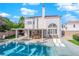 Inviting pool and patio area with pergola and lounge chairs at 1837 Birdie Ln, Henderson, NV 89074