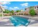 Inviting rectangular pool with a modern design and surrounding landscaping at 1837 Birdie Ln, Henderson, NV 89074