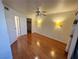 Bright bedroom featuring hardwood floors and ceiling fan at 1944 Las Palmas Ln # 175, Laughlin, NV 89029