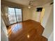 Bedroom with wood floors and access to balcony at 1944 Las Palmas Ln # 175, Laughlin, NV 89029