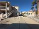 Walkway leads to inviting community with desert landscaping and building access at 1944 Las Palmas Ln # 175, Laughlin, NV 89029