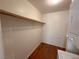 Laundry closet with washer, dryer and shelving at 1944 Las Palmas Ln # 175, Laughlin, NV 89029