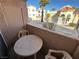 Small patio with table and chairs, overlooking the community at 1944 Las Palmas Ln # 175, Laughlin, NV 89029