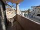 Community view from a small patio with chair at 1944 Las Palmas Ln # 175, Laughlin, NV 89029