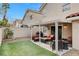 Covered patio and artificial turf in the backyard at 2153 Eaglecloud Dr, Henderson, NV 89074