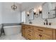 Modern bathroom with soaking tub and double vanity at 2153 Eaglecloud Dr, Henderson, NV 89074