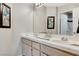 Bathroom with double sink vanity and large mirror at 2153 Eaglecloud Dr, Henderson, NV 89074