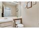 Clean bathroom with single sink vanity, toilet and mirror at 2153 Eaglecloud Dr, Henderson, NV 89074