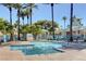 Community pool with lounge chairs and surrounding landscaping at 2153 Eaglecloud Dr, Henderson, NV 89074