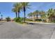 Residential street with palm trees and homes at 2153 Eaglecloud Dr, Henderson, NV 89074