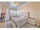 Main bedroom with a queen-size bed and access to a private patio at 225 Big Horn Dr # 5, Boulder City, NV 89005