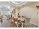 Dining area with a rustic wood table and six upholstered chairs at 225 Big Horn Dr # 5, Boulder City, NV 89005