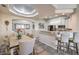 Kitchen and dining area with light wood table at 225 Big Horn Dr # 5, Boulder City, NV 89005