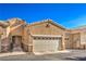 Two-story townhome with attached two-car garage at 225 Big Horn Dr # 5, Boulder City, NV 89005