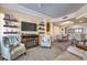 Comfortable living room with fireplace and built-in shelving at 225 Big Horn Dr # 5, Boulder City, NV 89005