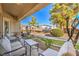 Relaxing patio with seating area and view of landscaping at 225 Big Horn Dr # 5, Boulder City, NV 89005