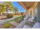 Private patio with seating area and walkway view at 225 Big Horn Dr # 5, Boulder City, NV 89005