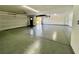 Spacious three-car garage with epoxy floor and upgraded door at 2250 Shaw Cir, Las Vegas, NV 89117