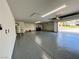 Spacious garage with epoxy flooring and ample storage at 2250 Shaw Cir, Las Vegas, NV 89117