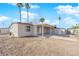 Backyard view of home with covered patio and shed at 2318 Howard Dr, Las Vegas, NV 89104