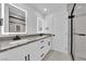 Bathroom with double vanity and gray quartz countertop at 2318 Howard Dr, Las Vegas, NV 89104