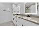 Modern bathroom with double vanity and LED lit mirror at 2318 Howard Dr, Las Vegas, NV 89104