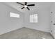 Bright bedroom with ceiling fan and wood-look floors at 2318 Howard Dr, Las Vegas, NV 89104