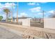 House exterior with gated entry and sidewalk at 2318 Howard Dr, Las Vegas, NV 89104