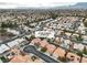 Aerial view of house and neighborhood, showcasing surrounding homes and landscape at 3105 Siena Cir, Las Vegas, NV 89128