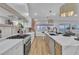 Spacious kitchen featuring a large island and white cabinetry at 3105 Siena Cir, Las Vegas, NV 89128