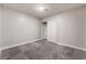 Spacious bedroom with sliding closet doors and carpet at 312 Crosswind Way, Las Vegas, NV 89145