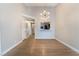 Bright dining area with wood-look floors and a view to the kitchen at 312 Crosswind Way, Las Vegas, NV 89145