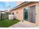 Small patio with artificial turf and lattice fence at 312 Crosswind Way, Las Vegas, NV 89145