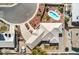 Aerial view of property featuring a private pool, desert landscaping, and tile roof at 3540 E Burgundy Dr, Pahrump, NV 89048