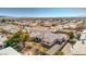 Beautiful aerial view of a desert home with desert landscaping, sparkling pool, and mountain views at 3540 E Burgundy Dr, Pahrump, NV 89048