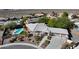 One-story house with pool and desert landscaping, aerial view at 3540 E Burgundy Dr, Pahrump, NV 89048