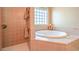 Relaxing bathroom with a large soaking tub and shower at 3540 E Burgundy Dr, Pahrump, NV 89048