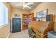 Home office with built-in shelves and rolltop desk at 3540 E Burgundy Dr, Pahrump, NV 89048