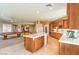 Kitchen with large island, pool table in background at 3540 E Burgundy Dr, Pahrump, NV 89048