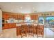 Kitchen with island, stainless steel appliances, view of pool at 3540 E Burgundy Dr, Pahrump, NV 89048