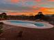 Stunning pool area at sunset at 3540 E Burgundy Dr, Pahrump, NV 89048