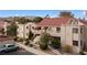 Two-story building complex with red tile roofs, parking, and mountain backdrop at 3810 Desert Marina Dr # 198, Laughlin, NV 89029