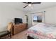 Spacious bedroom with dresser, TV, and ceiling fan at 3810 Desert Marina Dr # 198, Laughlin, NV 89029