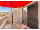 Relaxing patio featuring a table and chairs with an umbrella at 3810 Desert Marina Dr # 198, Laughlin, NV 89029