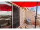 Private patio with seating area, umbrella, and sliding door access at 3810 Desert Marina Dr # 198, Laughlin, NV 89029