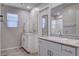 Bathroom featuring double sinks with granite counters and modern fixtures at 3812 Seyfert Ave, North Las Vegas, NV 89084