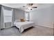 Main bedroom with carpet and ceiling fan at 3812 Seyfert Ave, North Las Vegas, NV 89084