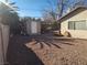 Backyard with shed and gravel ground cover at 3867 Jewel Ave, Las Vegas, NV 89121