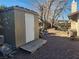 Backyard with shed and gravel ground cover at 3867 Jewel Ave, Las Vegas, NV 89121