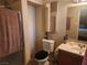 Bathroom with shower, toilet and vanity at 3867 Jewel Ave, Las Vegas, NV 89121